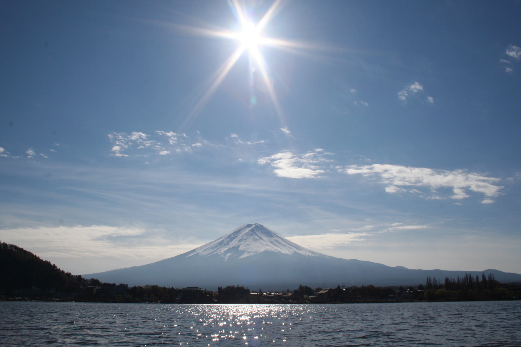 Mount Fuji rising beyond a lake in Japan.